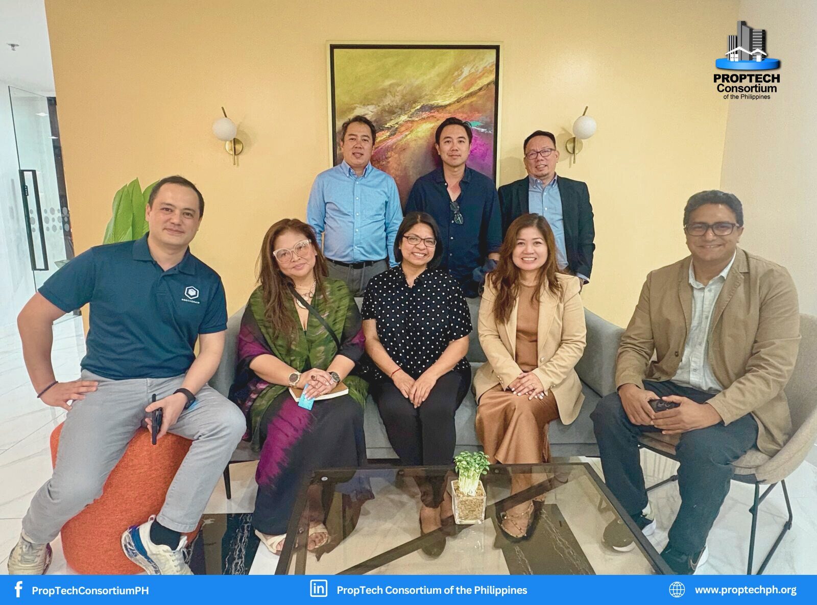 The photo shows Olivier Bariou, CEO of DOCONCHAIN (far left), among a group of individuals identified as the new board directors of the Proptech Consortium of the Philippines, gathered in a modern setting. Image by: Proptech Consortium PH